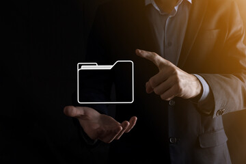 Businessman hold folder icon.Document Management System or DMS setup by IT consultant with modern...