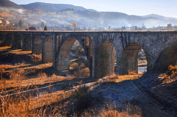 bridge near the lake among the Carpathian mountains
