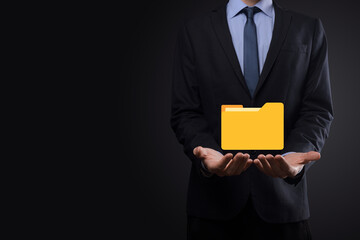 Businessman hold folder icon.Document Management System or DMS setup by IT consultant with modern...
