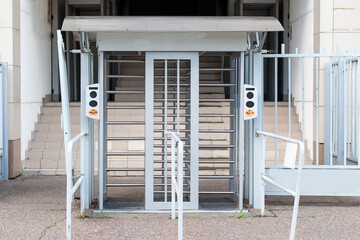 A turnstile at the stadium for spectators to pass by passes.