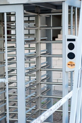 A turnstile at the stadium for spectators to pass by passes.