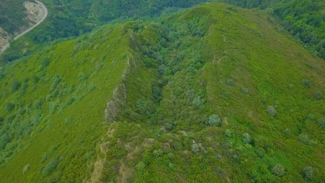 aerial view of the old Roman gold mine "a toca" on the green mountains of Caurel