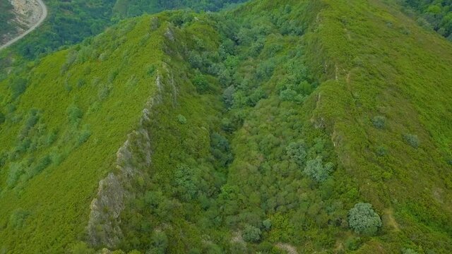 aerial view of the old Roman gold mine "a toca" on the green mountains of Caurel