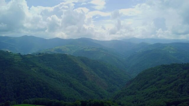 aerial view.clouds forming a summer storm over the green mountains of Caurel, Galicia