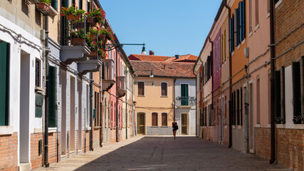 Typical street with its houses in Murano