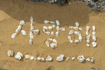 Fototapeta na wymiar inscription on the sand