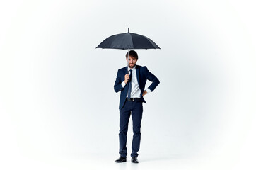 man wearing umbrella rain protection weather