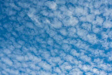 Fototapeta na wymiar Beautiful white clouds against the blue sky.