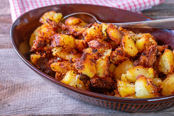 fried potatoes in a rustic bowl