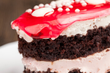 cake with cream and cherry berry jam