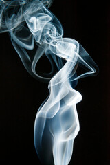 White smoke on black background