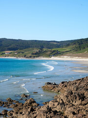 Fototapeta na wymiar Nemiña beach in Atlantic Galician Coast, Spain. This beach of northern Spain is known for its unspoiled coastline and surfing waves.