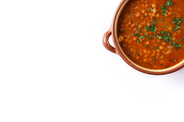 Red lentil soup in bowl isolated on white background.Copy space