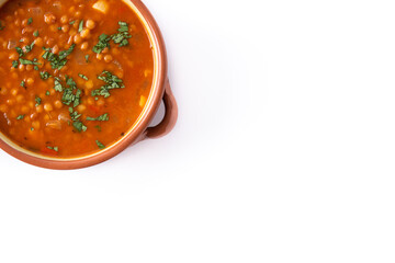 Red lentil soup in bowl isolated on white background.Copy space