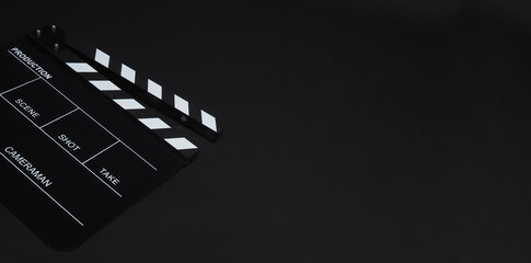 Clapperboard or clap board or movie slate use in video production ,film, cinema industry on black...