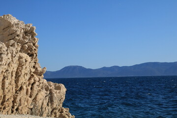 Fototapeta na wymiar Adriatic sea coast in summer with rocks and water