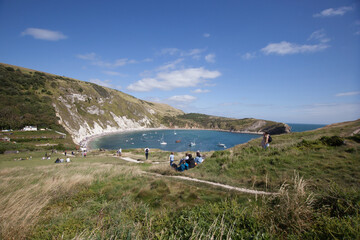 Fototapeta na wymiar Views of Lulworth Cove in Dorset on a summer day in the UK