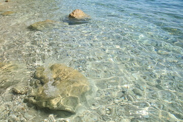 Adriatic sea coast in summer with rocks and water