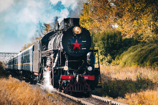 Russia, Sortovala, Karelia: 31.08.2021 Vintage black steam locomotive train on the railway