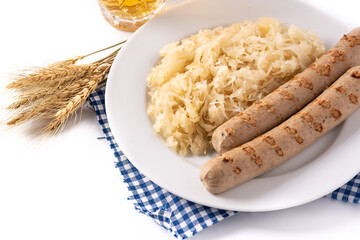 Bratwurst sausage ,sauerkraut, pretzels and beer isolated on white background. Typical german food	