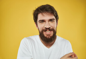 Fototapeta premium emotional man in a white t-shirt serious look Lifestyle