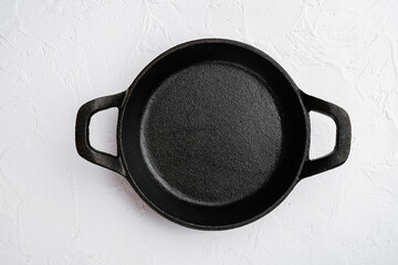 Empty cast iron skillet with copy space for text or food with copy space for text or food, top view...