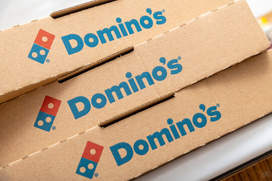 Antalya, Turkey - September 10, 2021: Domino's Pizza logo detail on a recycled pizza box.