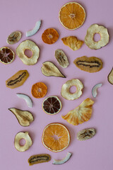 Useful vitamins in dried fruits on the background