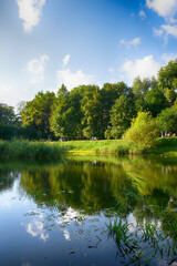 Beautiful lake in the city park in the autumn season