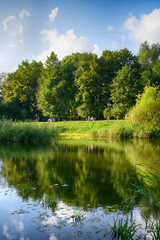 Beautiful lake in the city park in the autumn season