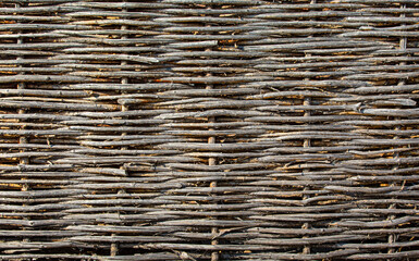 old wicker fence texture. Close up. Selective focus