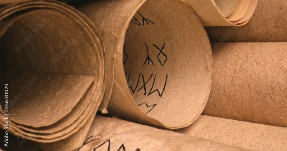 Poster old scrolls stacked on a pile. medieval manuscripts library.