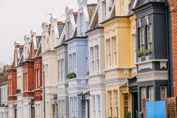 Row of colourful houses in Hammersmith & Fulham area of south west London- UK  - obrazy, fototapety, plakaty