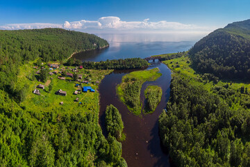Aerial view of the Polovinnaya River flowing into Lake Baikal