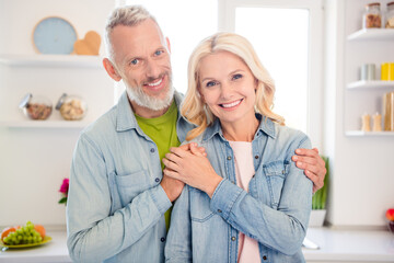 Photo of cheerful smiling good mood married couple wife and husband hug embrace cuddle each other...