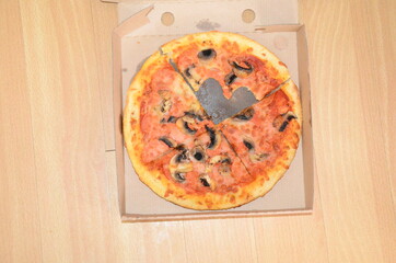 a slice of tasty pizza fresh from the pizza oven 