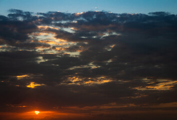 Beautiful fluffy clouds during sunset. Ceiling replacement tool.
