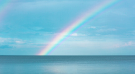 Rainbow Over The Ocean. Rainbow in the sea.