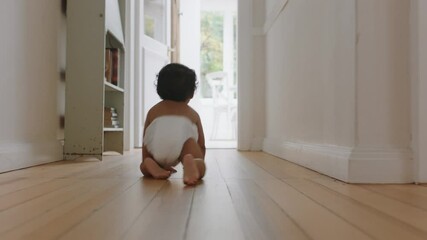 baby girl crawling on floor toddler exploring home curious infant having fun enjoying childhood