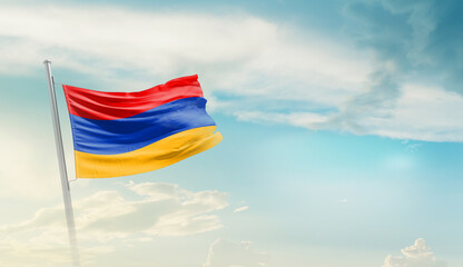 Armenia national flag cloth fabric waving on the sky with beautiful sun light - Image