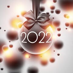 2022 sign in hanging black and yellow Christmas ball.