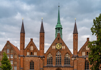 Obraz premium The old city center of the Hanseatic City of Lübeck (Hansestadt Lübeck), Northern Germany. Cradle and de facto capital of the Hanseatic League. A UNESCO World Heritage Site.