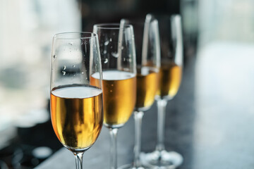 closeup a glass of champagne on table