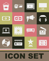 Set Online play video, Movie clapper, Headphones, VHS cassette tape, Popcorn box and Megaphone icon. Vector