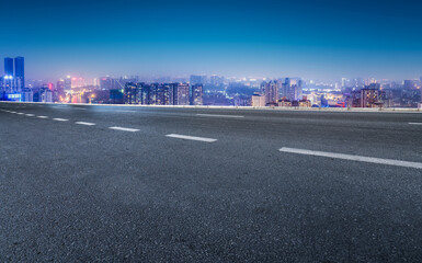 Road and city buildings background