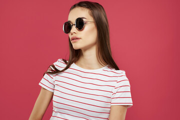 cheerful pretty woman wearing sunglasses striped tshirt fashion modern style