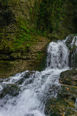 MARTVILI, GEORGIA: Beautiful natural Martvili canyon with view of the mountain river and waterfall.