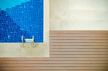Swimming pool and wooden floor top view