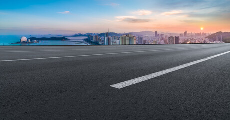 Road and city buildings background