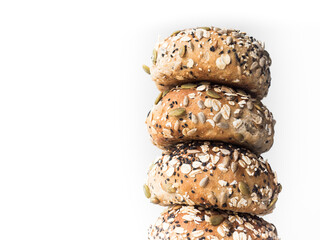 stack of mixed seed bread rolls
